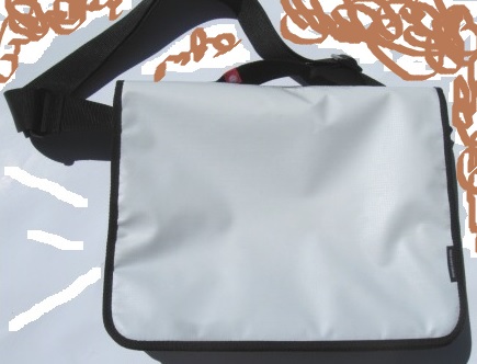 A recycled laptop bag made from Powershop's Baby Trump billboard campaign.